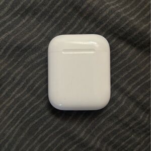Apple AirPods first generation in ear headphones with charging case